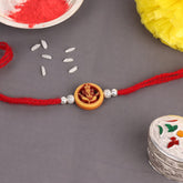 Brown Designer Ganesha Silver Beads Rakhi